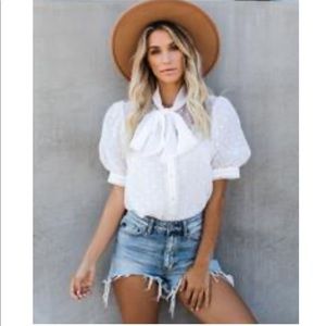 White polka dot bow shirt